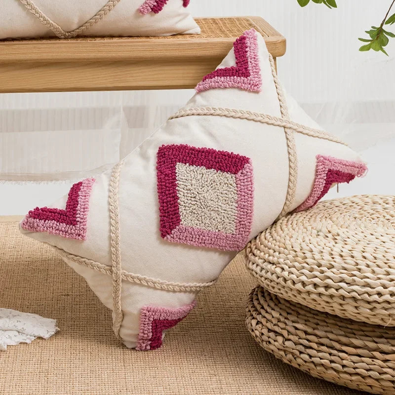 Decorative pillow with pink and white pattern on a textured surface Nordic blue tufted cushion cover with geometric stripe and grid crochet pattern, tassel pillow cover for sofa, bed, and boho home decor