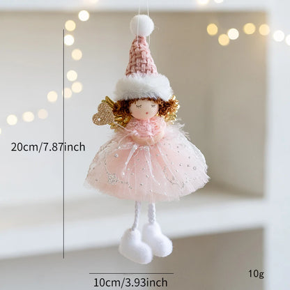 Decorative doll Christmas Ornament with pink dress and hat on a neutral background