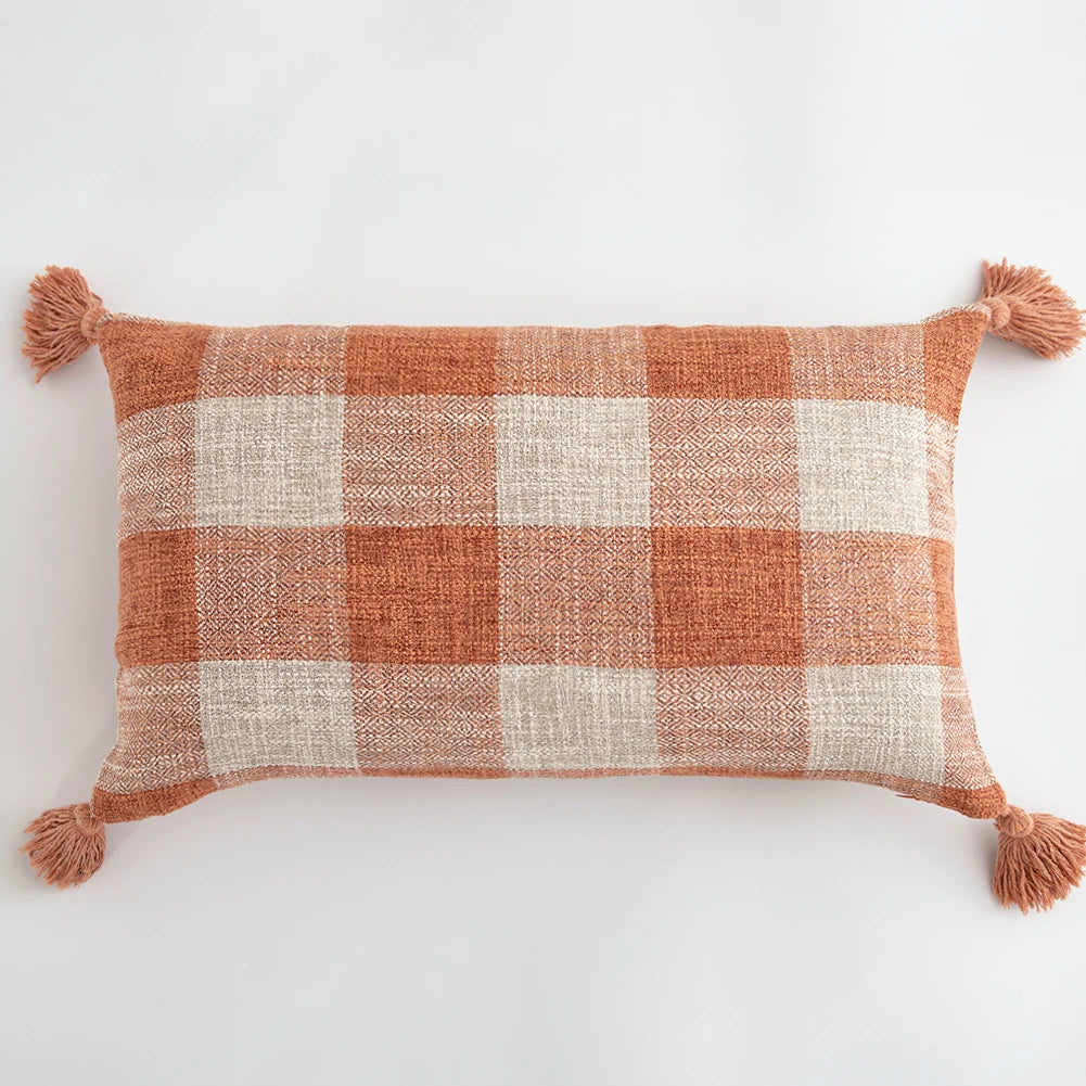Orange linen tassels cushion cover styled on modern sofa, decorative boho throw pillow for living room, bed, or chair, perfect for cozy home vibes and housewarming gift ideas. Square and Rectangle.
