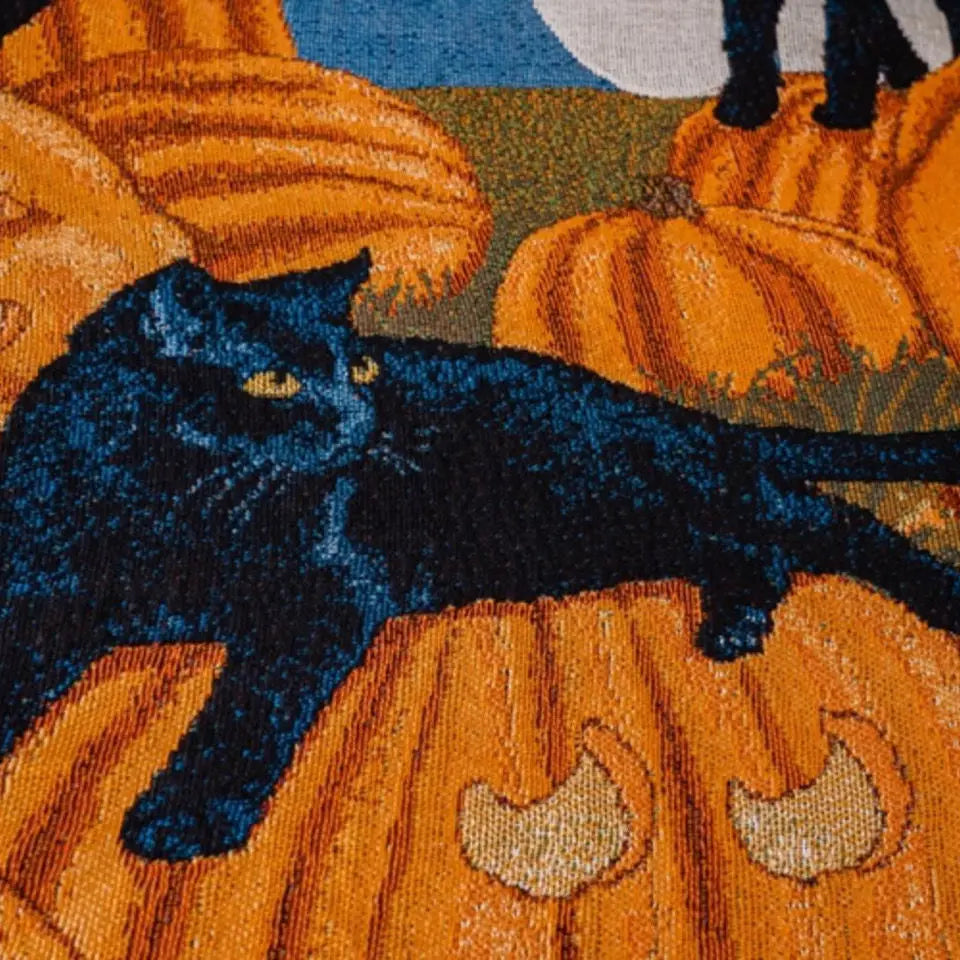Black cat on pumpkins with a moonlit sky background Halloween black cat and pumpkin throw blanket, woven spooky tapestry for autumn decor