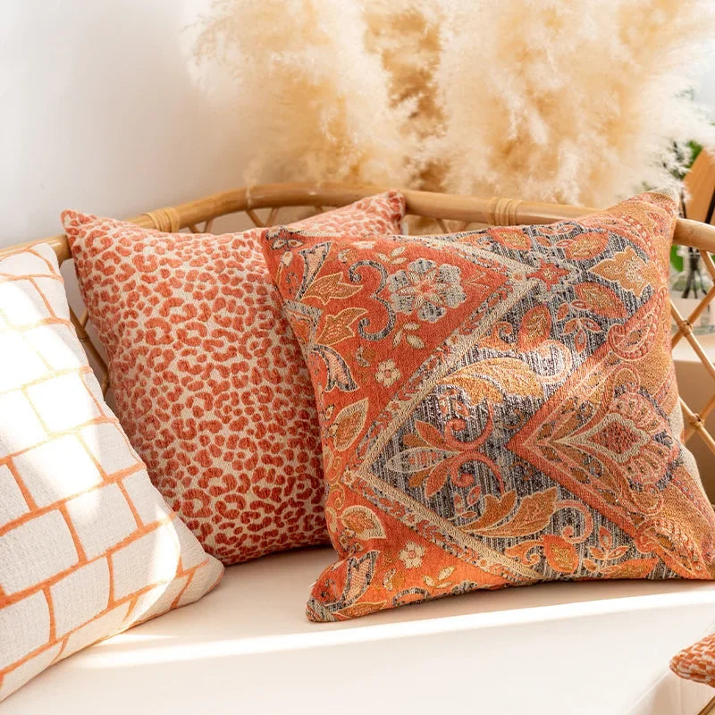 Decorative pillows with floral patterns on a couch