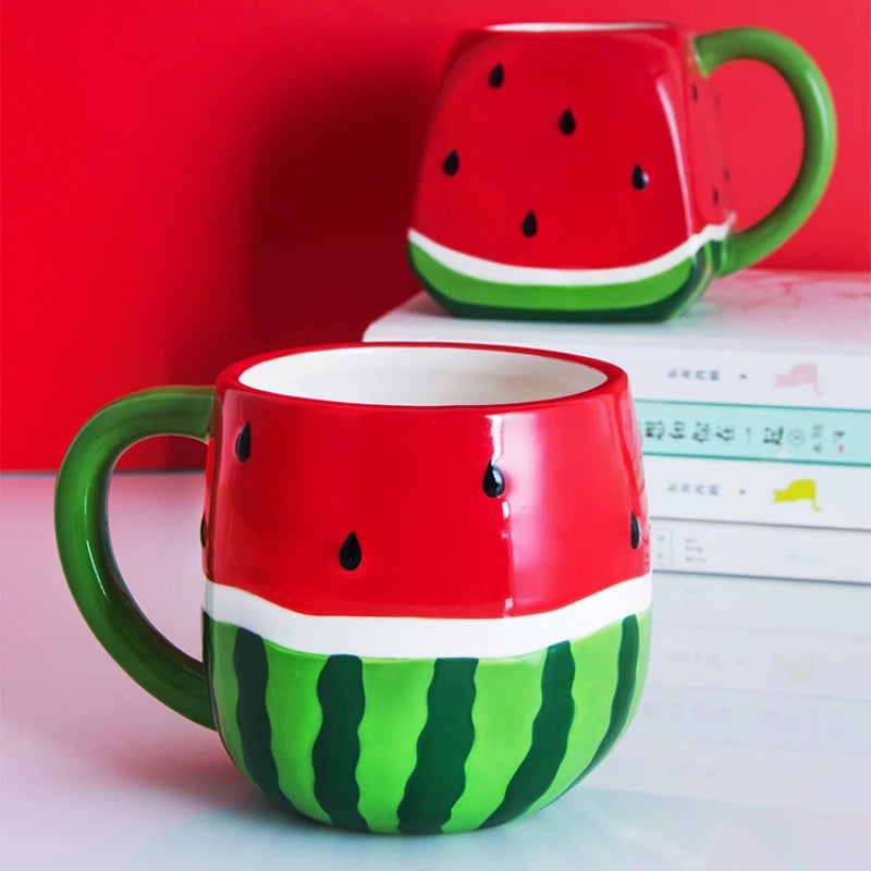 Two watermelon-themed mugs on a surface with a red background Creative watermelon ceramic mug, kawaii coffee and milk cup with hand-painted design, 500ml porcelain drinkware for kitchen decor