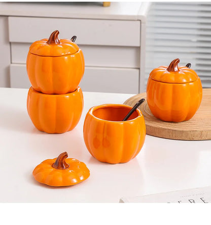 Set of orange pumpkin-shaped ceramic containers on a white surface. Pumpkin-shaped ceramic bowl with lid kitchen container Halloween and Thanksgiving fall serving dish