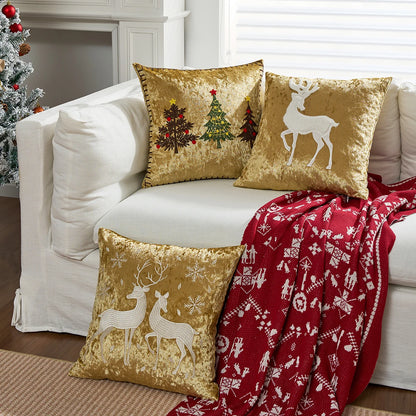 Decorative pillows with Christmas designs on a white couch with a red blanket. Christmas embroidered pillow cover in gold, 18x18 inch festive cushion case for sofa, bed, or holiday home décor. Christmas Gift Ideas
