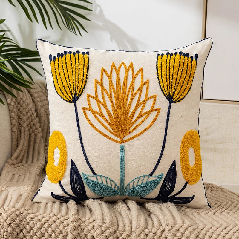 Vintage floral Lotus Flower embroidered pillowcase styled on a sofa, boho throw cushion cover adds texture and charm to bohemian home decor, perfect for cozy living room decor, eclectic home styling, and unique boho gifts under $50