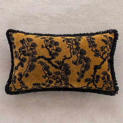 Decorative pillow with black floral pattern on mustard yellow background. embroidery throw pillow cover in boho modern style