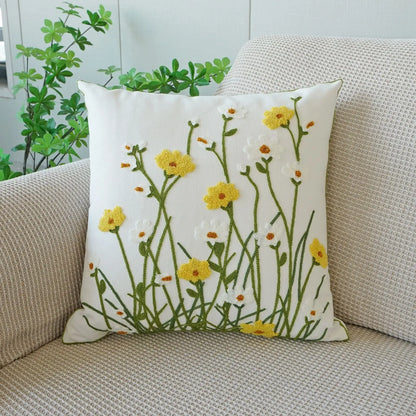 Decorative pillow with floral pattern on a beige couch. Floral embroidered throw pillow cover boho decor