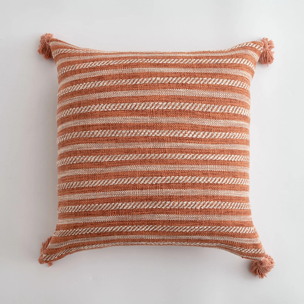 Orange linen tassels cushion cover styled on modern sofa, decorative boho throw pillow for living room, bed, or chair, perfect for cozy home vibes and housewarming gift ideas. Square and Rectangle.