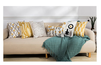 Row of Pillows on A Couch Cozy Embroidered Throw Pillow Cover – Nordic-Inspired Boho Home Decor Accent