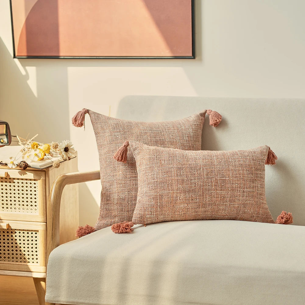 Orange linen tassels cushion cover styled on modern sofa, decorative boho throw pillow for living room, bed, or chair, perfect for cozy home vibes and housewarming gift ideas. Square and Rectangle.