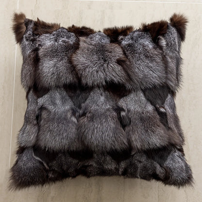 Fur throw blanket with a striped pattern on a beige background. embroidery throw pillow cover in boho modern style
