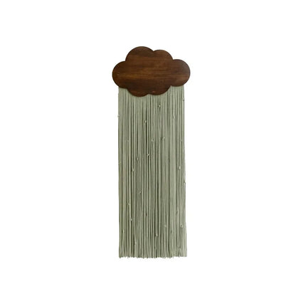 Decorative wall hanging with a wooden cloud top and string design on a white background