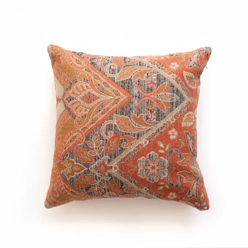 Decorative pillow with intricate pattern on a white background