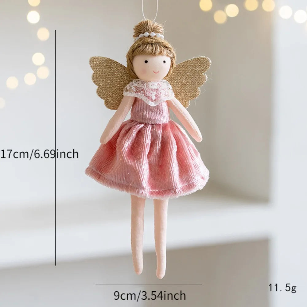 Small angel doll with wings Christmas Ornament, pink dress, and measurement details on a neutral background.