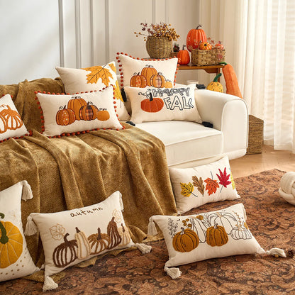 Living room with fall-themed pillows and decorations on a couch. Festive autumn pumpkin cushion case for sofa or bed.