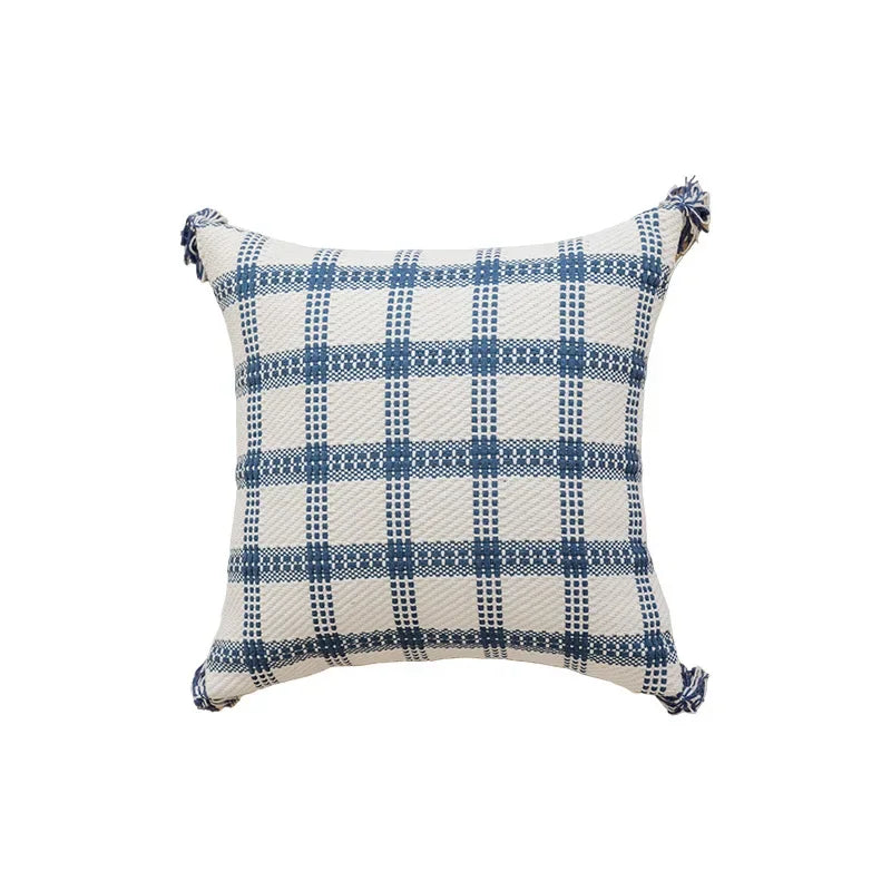 Blue and white checkered pillow with tassels on a white background Nordic blue tufted cushion cover with geometric stripe and grid crochet pattern, tassel pillow cover for sofa, bed, and boho home decor
