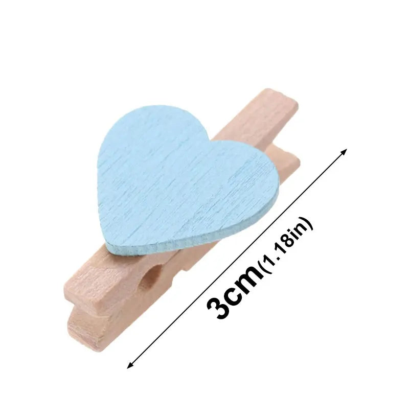 Heart-shaped blue clip on a wooden clip with measurement text