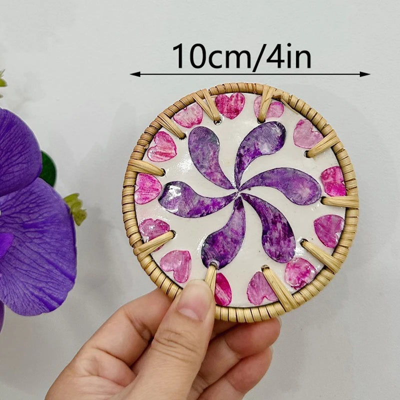 Decorative circular boho coaster with purple and pink design held by a hand, with a measurement label on a light background.