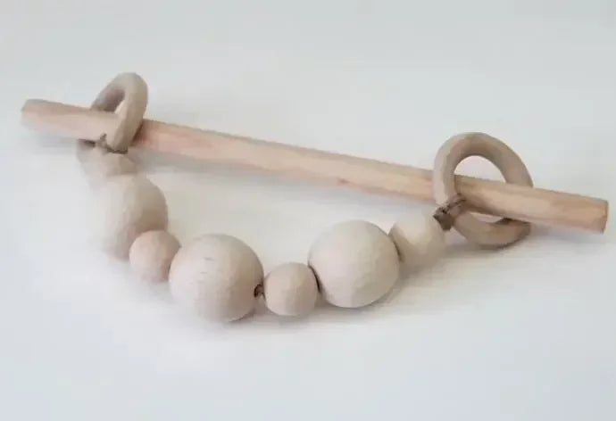 Wooden baby teething ring with beads on a white background boho home decor, curtain tie back, wooden curtain buckle, nordic home accessory, hemp rope curtain tie, rustic window decor, boho curtain accessory, modern farmhouse, minimalist curtain hold, housewarming gift idea