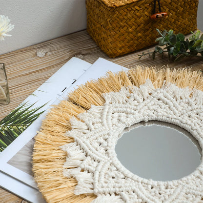 Round mirror with macrame frame on a wooden surface with a woven basket and plant in the background. boho home decor, boho wall mirror, macrame wall mirror, nordic decor, romantic wedding wall decoration, housewarming gift, round straw mirror, woven wall decor, tapestry mirror, boho bedroom wall accent, rustic mirror wall hanging