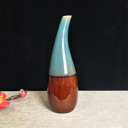 Boho Ceramic vase with two-tone design on a textured surface with a black background