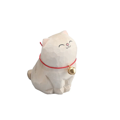 White cat-shaped plush toy with a red string and gold bell on a white background