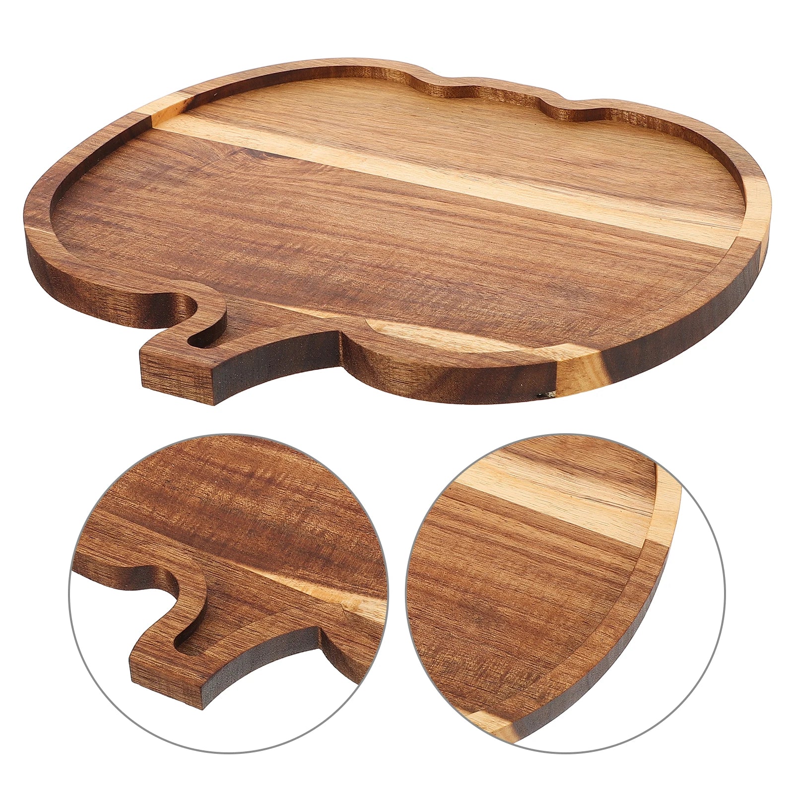 Wooden cutting board with unique shape on a white background. Rustic wooden pumpkin serving platter with natural grain, charcuterie board for Thanksgiving snacks, Halloween desserts, and fall entertaining