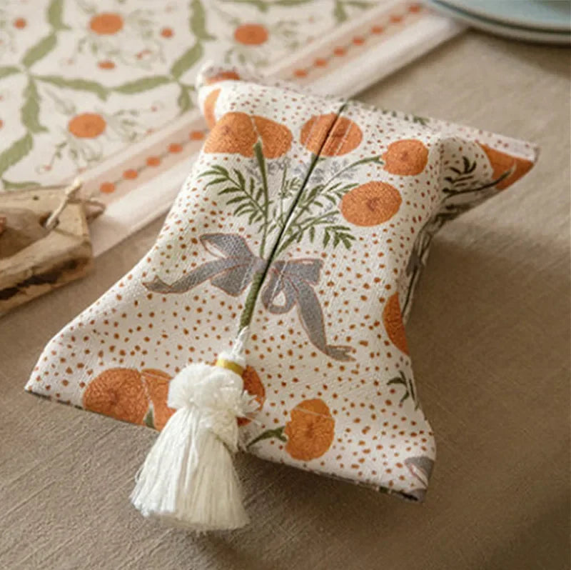 Decorative tissue holder with pumpkin pattern on a table boho home decor, reusable tissue bag, cotton tassel tissue holder, plush tissue organizer, bathroom tissue box cover, car tissue case, American style tissue pouch, soft fabric tissue holder, decorative tissue box, housewarming gift, eco-friendly storage