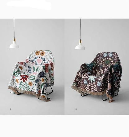 Two patterned blankets draped over chairs on a plain background with 'Double sided available' text. Deer forest jacquard woven blanket with floral and woodland tapestry design – boho throw for sofa or bed, soft cotton blend decorative bedspread for cozy home décor.