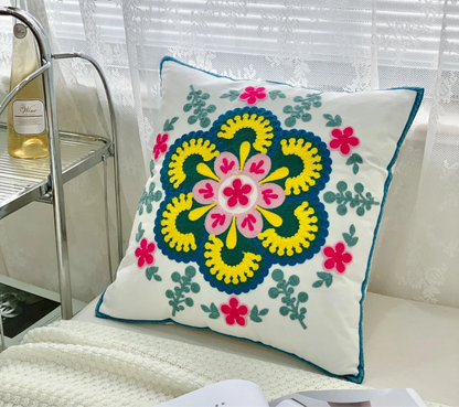 Decorative pillow with floral pattern on a couch, floral embroidery on linen cotton cushion cover – boho home decor accent