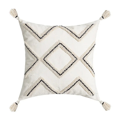 Decorative pillow with geometric pattern and tassels on a white background Nordic blue tufted cushion cover with geometric stripe and grid crochet pattern, tassel pillow cover for sofa, bed, and boho home decor