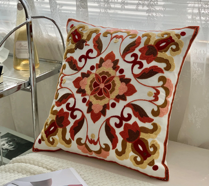 Decorative pillow with floral pattern on a couch, floral embroidery on linen cotton cushion cover – boho home decor accent