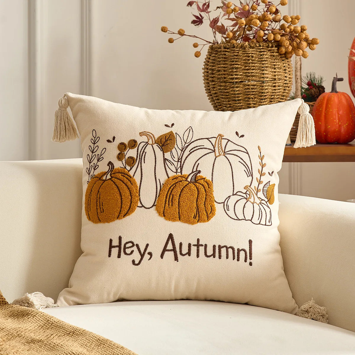 Decorative pillow with pumpkins and 'Hey, Autumn!' text on a couch. Halloween and Thanksgiving decorative pillow cover For Fall