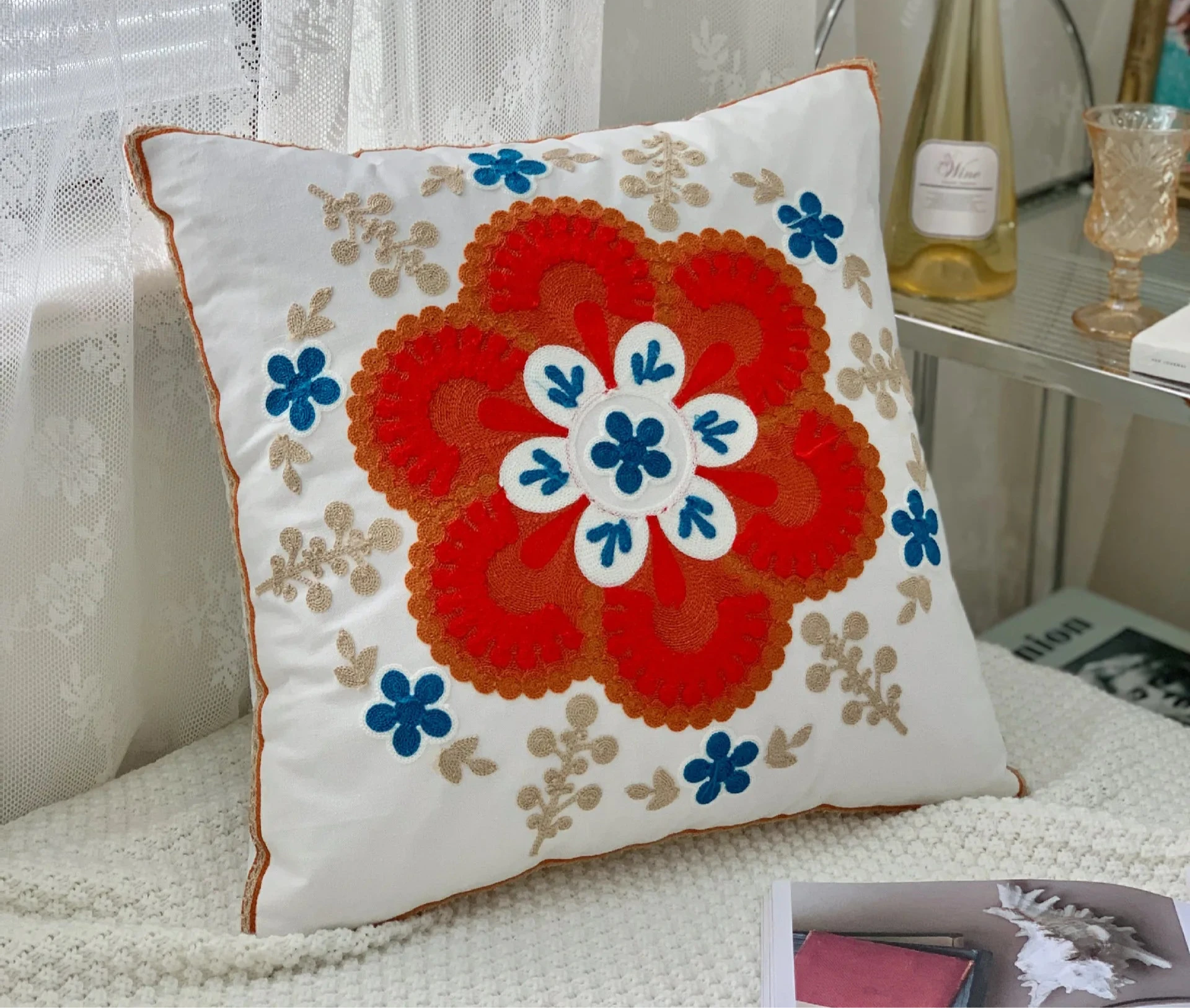 Decorative pillow with a floral pattern on a couch, floral embroidery on linen cotton cushion cover – boho home decor accent
