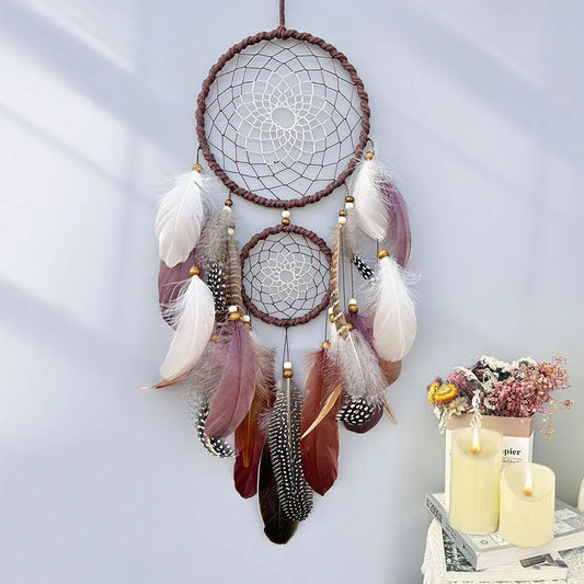 Decorative dreamcatcher with feathers on a light gray wall. boho home decor, housewarming gift, dream catcher wall hanging, feather wind chime, handmade dreamcatcher, colorful boho wall decor, birthday gift decor, modern bohemian style, bedroom hanging ornament, spiritual home decor, dreamcatcher nursery decor