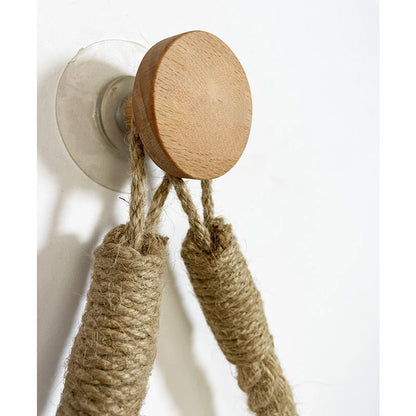 Wooden wall hook with jute ropes on a white background. Boho rope toilet paper holder, nail-free wall mounted paper towel rack, rustic bathroom storage and decor accessory with wood and rope design