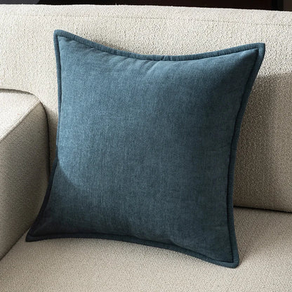 Blue pillow on a beige sofa