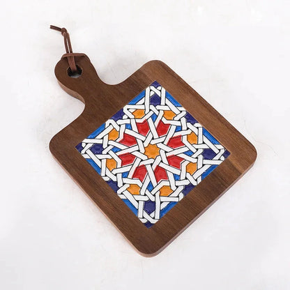Wooden cutting board with geometric design on a white background