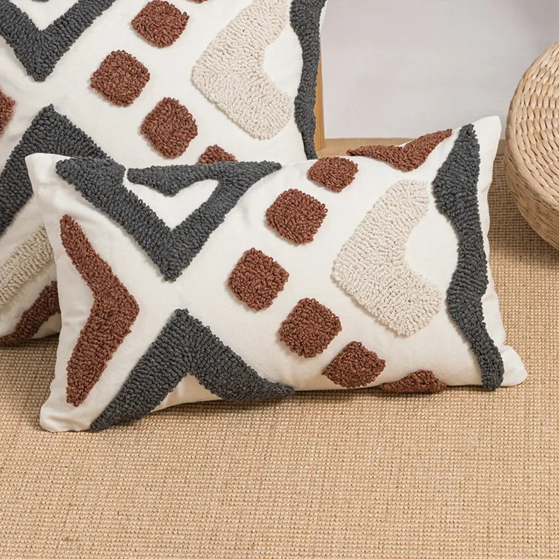 Decorative pillows with geometric patterns on a textured surface Nordic blue tufted cushion cover with geometric stripe and grid crochet pattern, tassel pillow cover for sofa, bed, and boho home decor
