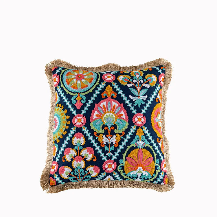 Decorative pillow with colorful geometric pattern on a white background. Bohemian embroidered throw pillow cover with geometric design, cotton-blend cushion for sofa, bed, or modern home decor.