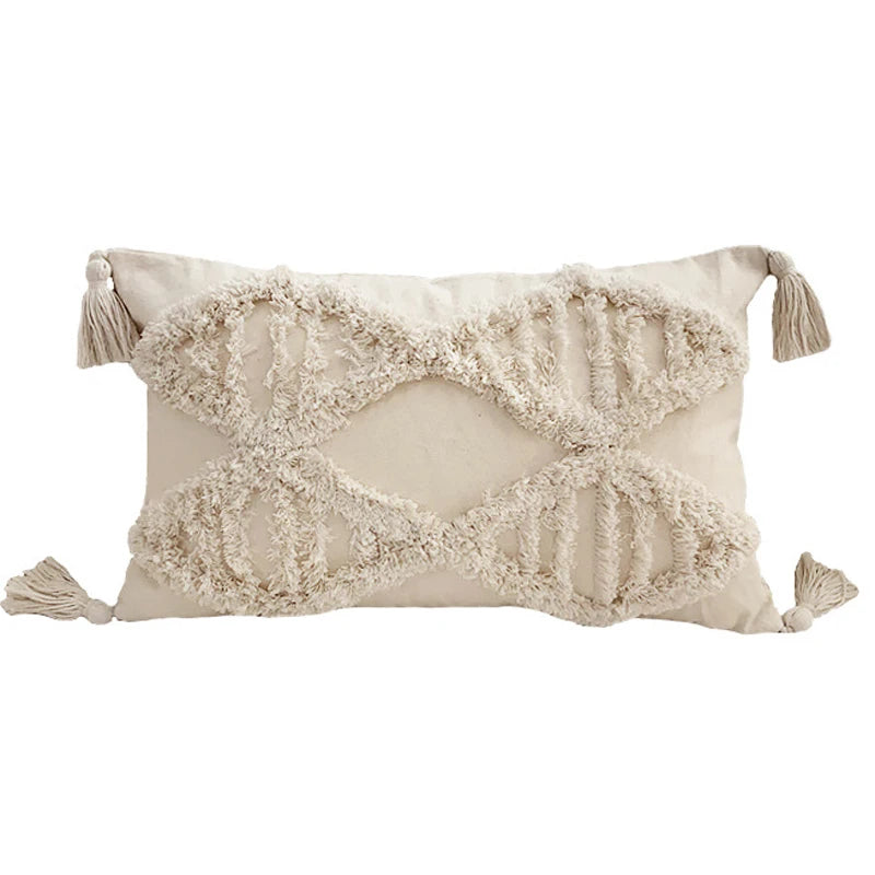 Decorative pillow with tassels on a white background