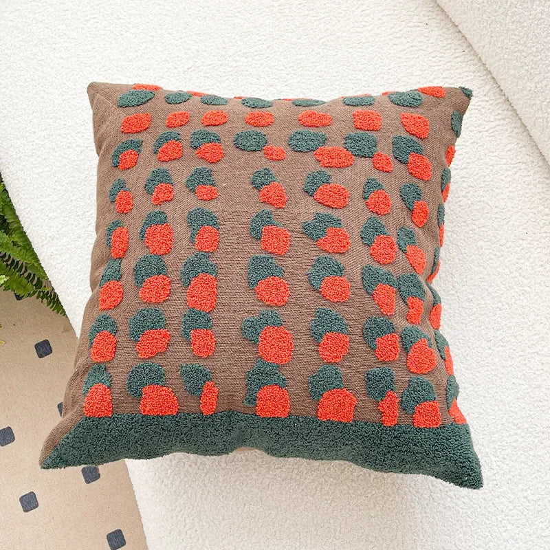 Decorative pillow with red and green pattern on a neutral background. Bohemian embroidered throw pillow cover 18x18 inch with geometric towel embroidery, decorative cushion for sofa, bed, or living room boho home decor