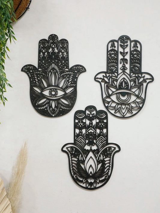 Boho Gothic wall decor featuring a black wooden hand with evil eye centerpiece, perfect for mystical home or dorm room decoration.