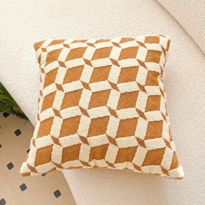 Decorative pillow with geometric pattern on a beige surface. Bohemian embroidered throw pillow cover 18x18 inch with geometric towel embroidery, decorative cushion for sofa, bed, or living room boho home decor
