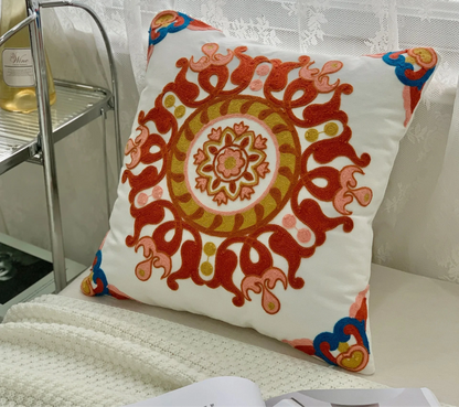 Decorative pillow with intricate patterns on a couch, floral embroidery on linen cotton cushion cover – boho home decor accent