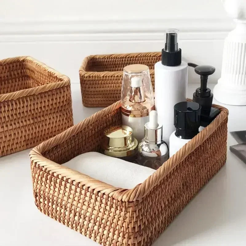 Woven storage baskets with skincare products on a white surface boho home decor, rattan basket, handwoven wicker basket, fruit storage box, bread basket, picnic basket, natural storage bin, tea storage box, rustic home organization, farmhouse decor, housewarming gift, boho storage basket