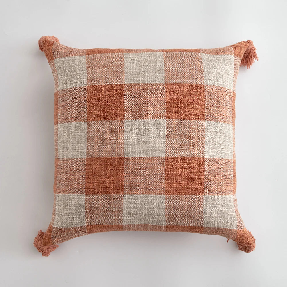 Orange linen tassels cushion cover styled on modern sofa, decorative boho throw pillow for living room, bed, or chair, perfect for cozy home vibes and housewarming gift ideas. Square and Rectangle.