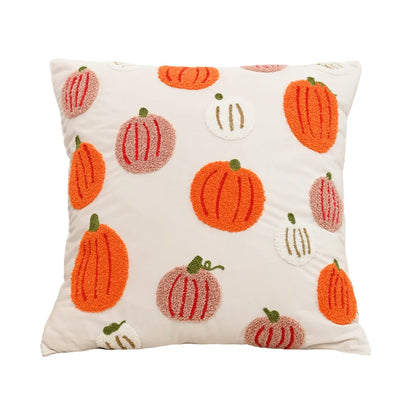 Decorative pillow with pumpkin pattern on a white background