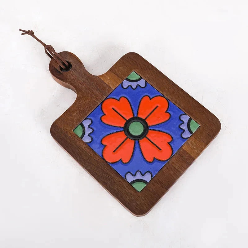 Wooden cutting board with a colorful floral design on a white background