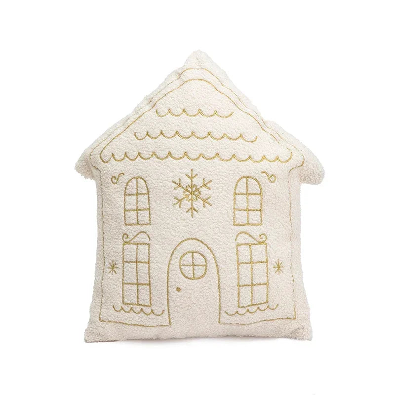 Decorative pillow shaped like a house with embroidered details on a white background